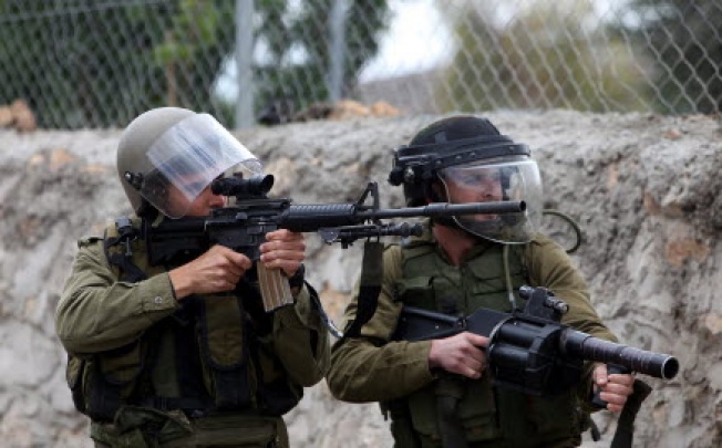 Israeli soldier, who on Tuesday while patrolling the Golan Heights, returned fire from Syria. Photo: AP