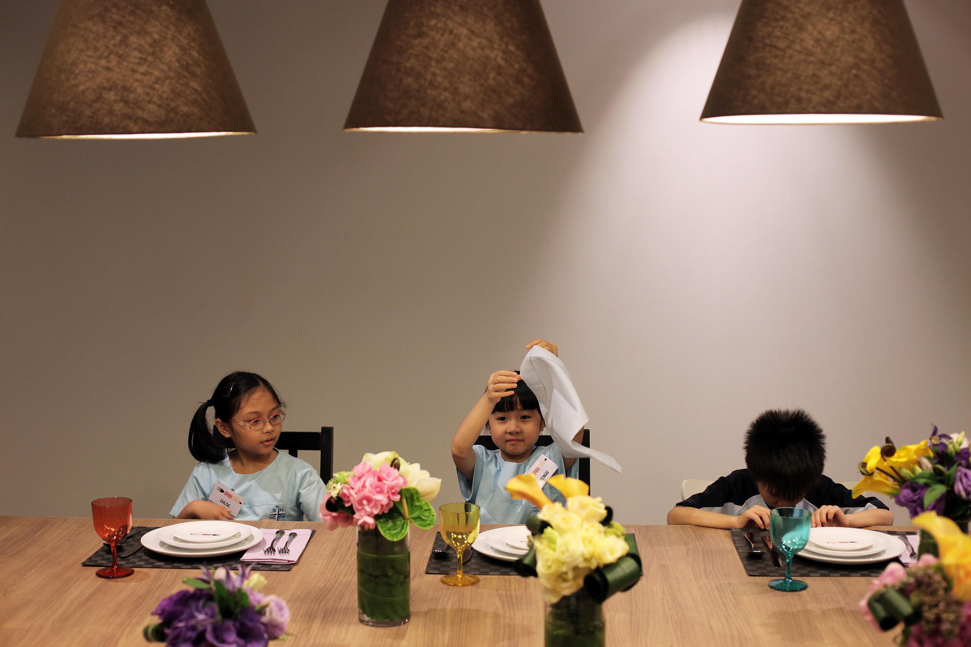Children learn table etiquette and cooking skills at Spark Studios, founded by Yoshiko Hariu. Photo: SCMP