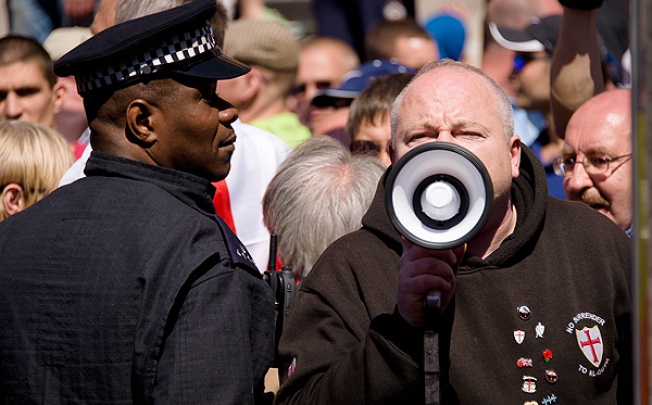 Supporters of the far-right English Defence League (EDL) shout slogans near Downing Street in central London. Photo: AFP