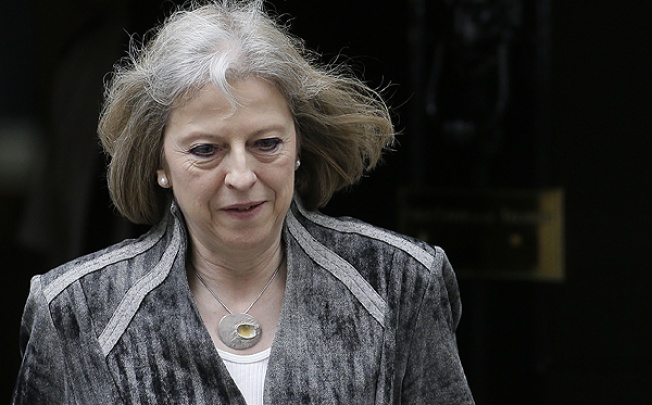 Britain's Home Secretary Theresa May leaves 10 Downing Street. Photo: AP