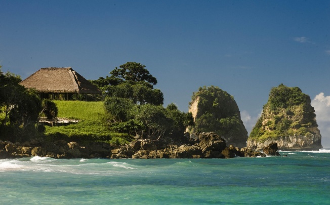 Towering limestone outcrops overlook the resort. Photos: Djuna Ivereigh