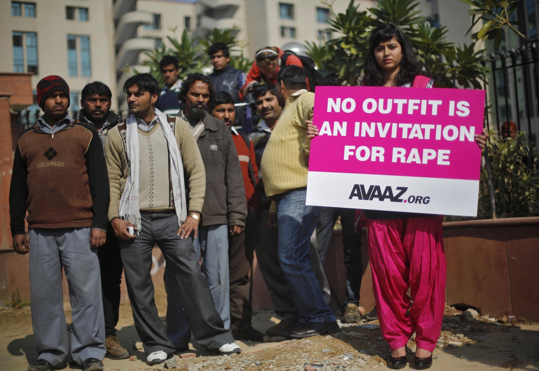 An woman in New Delhi holds a placard protesting against recent rapes in India. An American woman has been gang-raped in the northern Indian resort town of Manali, police said. Photo: Reuters