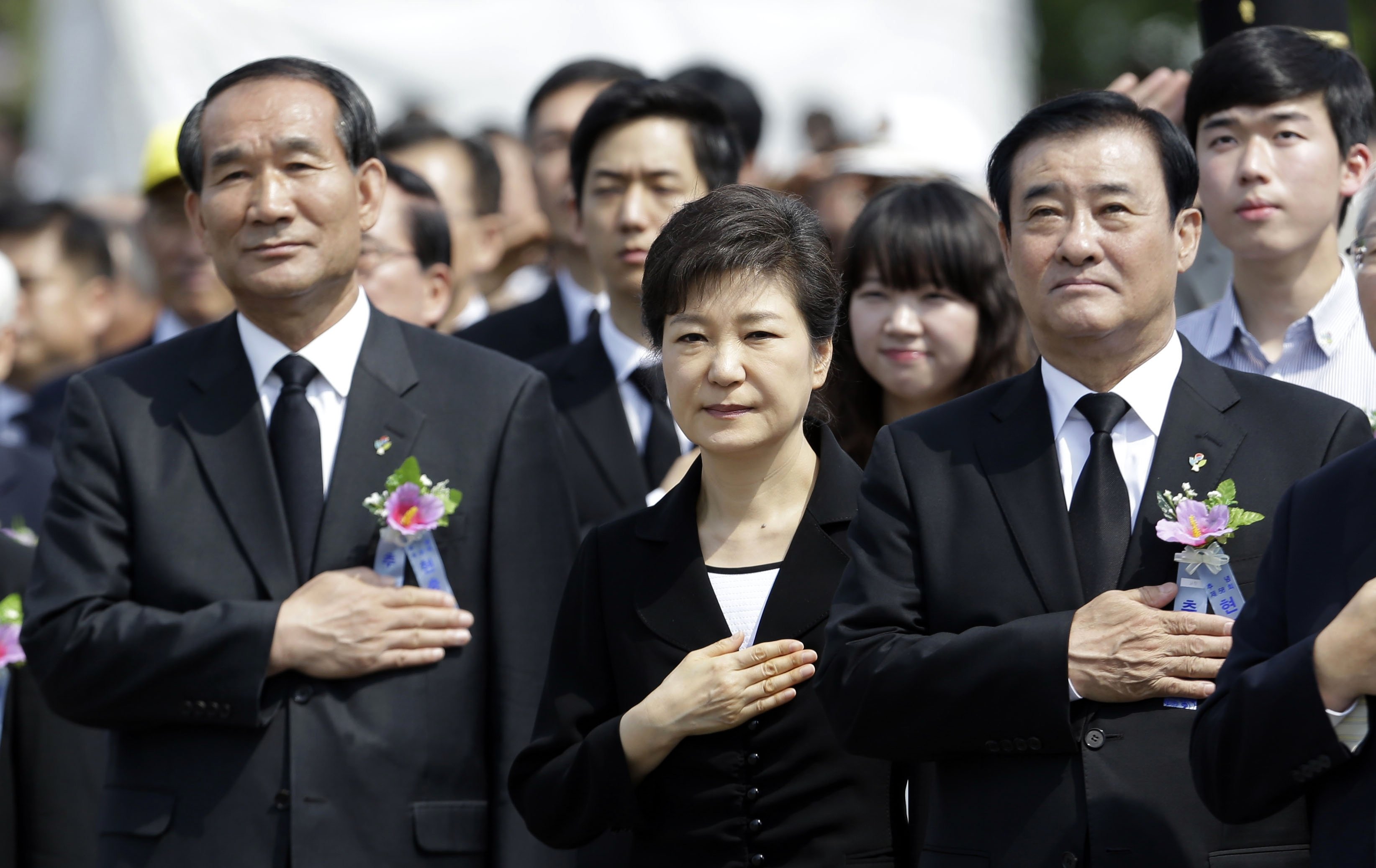 South Korean President Park Geun-hye (centre) at a 58th Memorial Day ceremony in Seoul on Thursday. North and South Korea have agreed to hold talks on re-opening a jointly-run factory complex in the North. Photo: AP 