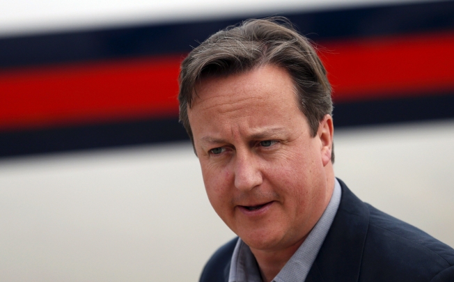 Britain's Prime Minister David Cameron arrives at Belfast International Airport, Northern Ireland. Photo: AFP