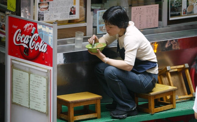 A young woman having lunch in Hong Kong. Photo: SCMP Pictures
