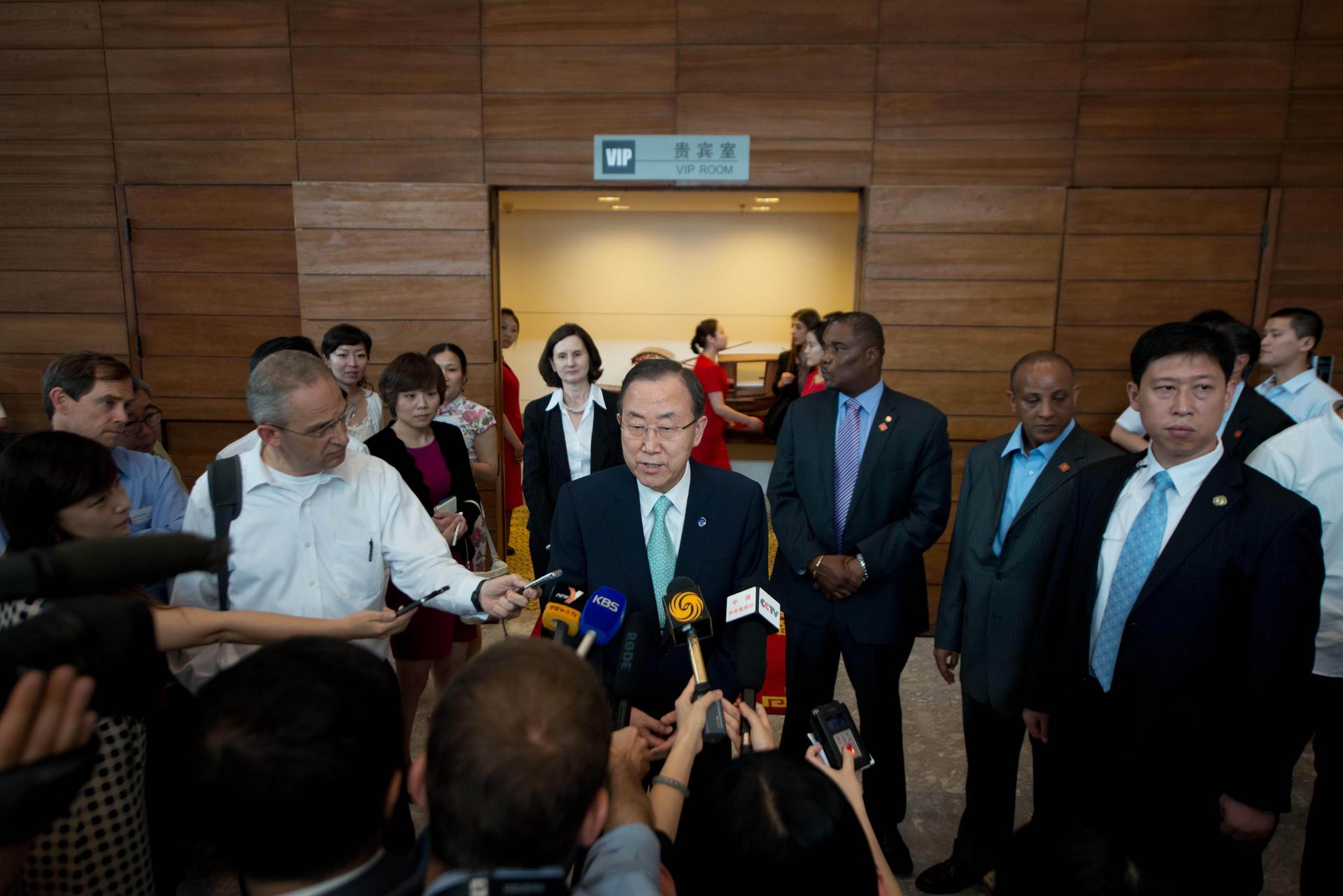 UN Secretary-General Ban Ki-moon talks to the media after visiting a 'low-carbon' exhibition in Beijing. Photo: AFP