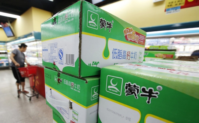Mengniu stock jumps 6.9 per cent after offer of HK$12.5 billion for infant formula maker Yashili International. Photo: Reuters