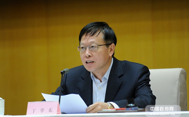 Ding Xuedong, then deputy secretary-general of the State Council, hosts a meeting in Beijing on January 18, 2013. Photo: SCMP