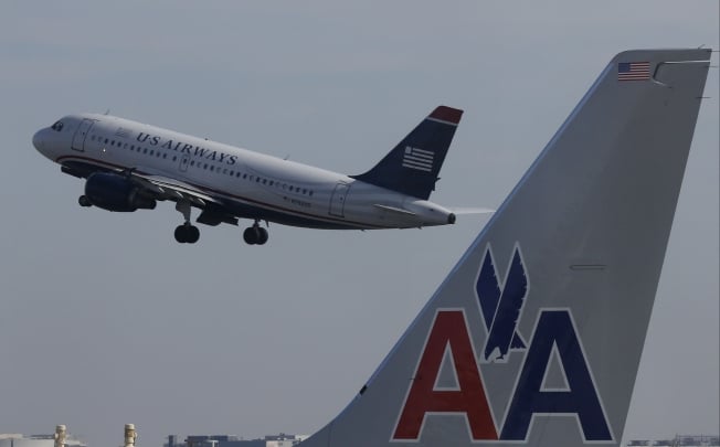 US Airways said in February that it planned to merge with American Airlines to create an US$11 billion airline. Photo: Reuters