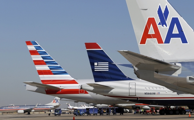 Opposition to the planned American Airlines-US Airways merger is mounting. Photo: AP