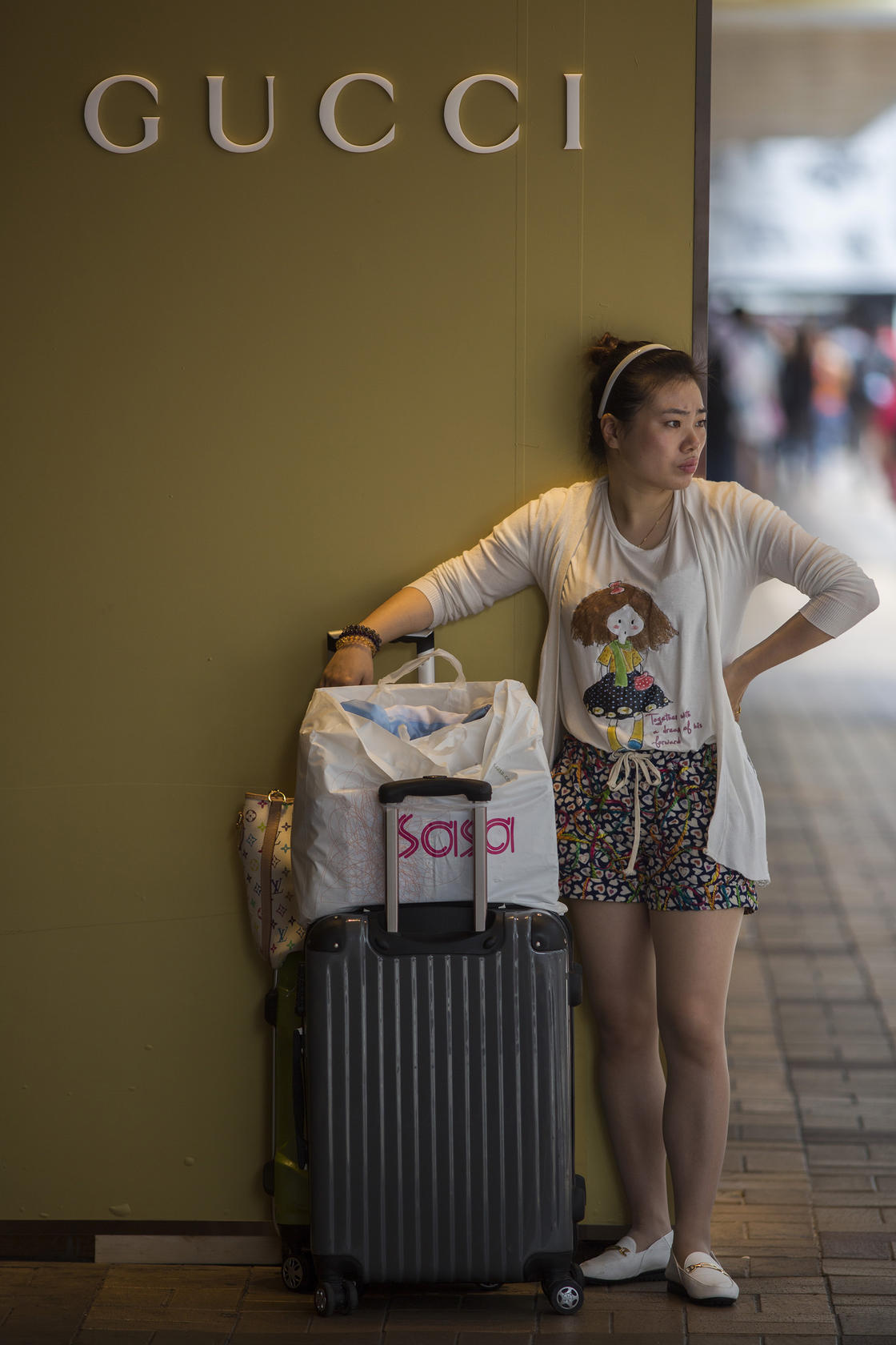 Mainlanders and their luxury booty have transformed the face of shopping districts such as Tsim Sha Tsui. Photo: Bloomberg