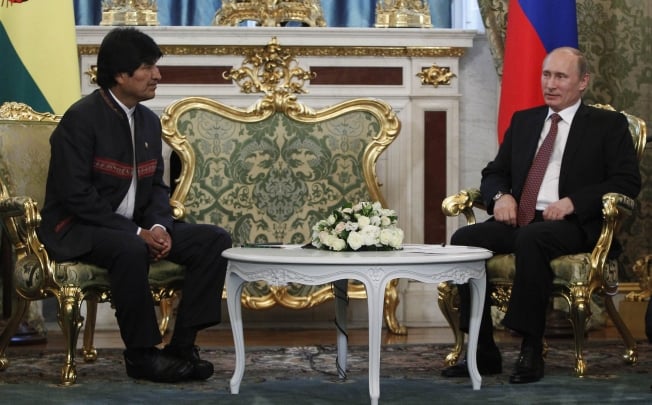 Russia's President Vladimir Putin speaks with his Bolivian counterpart Evo Morales in Moscow. Photo: AFP