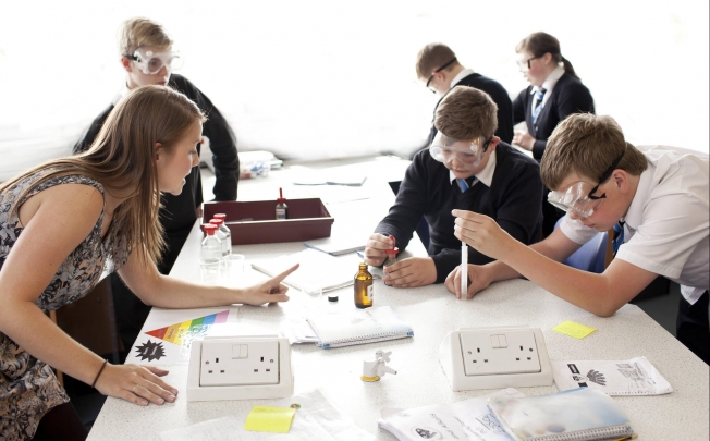 Lauren Neilson teaches her biology students at Bishopbriggs Academy. Photo: NYT