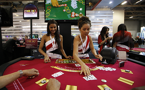 Every month, 2.5 million tourists flood Macau to try their luck. Photo: AP