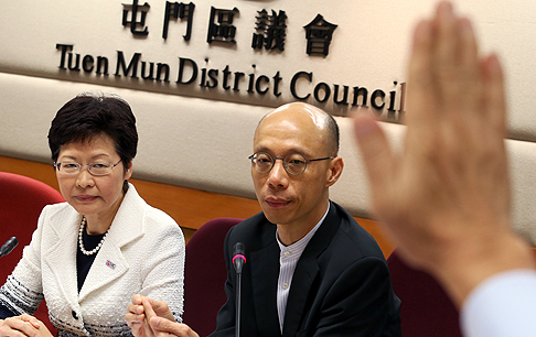 Chief Secretary Carrie Lam (left) and Secretary for the Environment Wong Kam-sing take questions at a Tuen Mun district council meeting on Thursday.  Photo: Dickson Lee