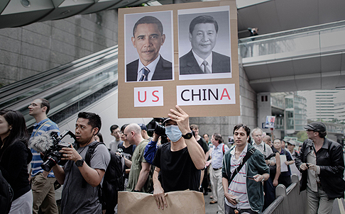 Protesters march to the US consulate in Hong Kong in support of US whistle-blower Edward Snowden on June 15. Photo: AFP