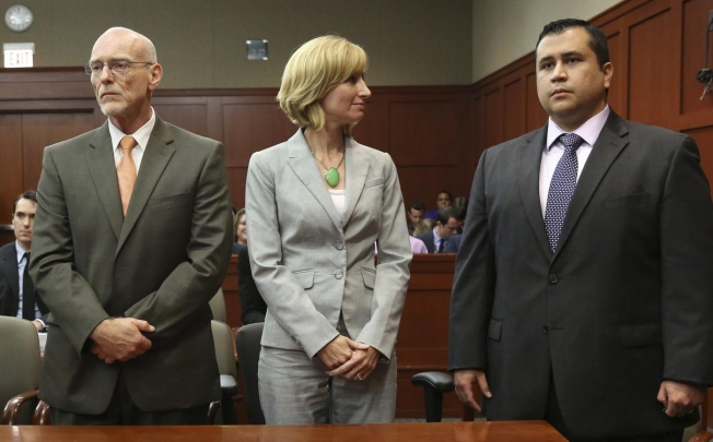Defendant George Zimmerman listens impassively as the not-guilty verdict is delivered. Photo: Reuters