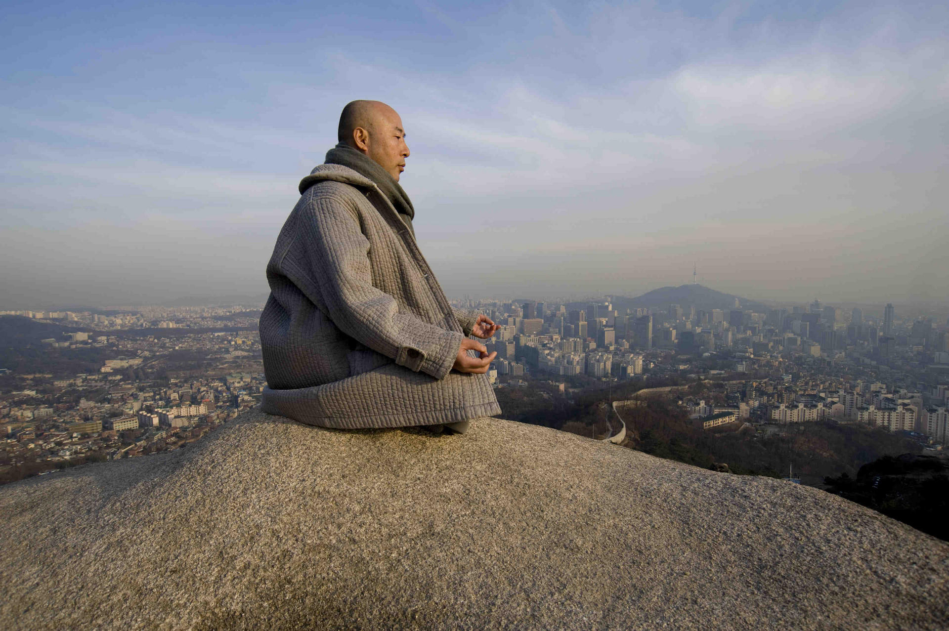 A quiet moment on Mount Bugak, with its sweeping views of Seoul.