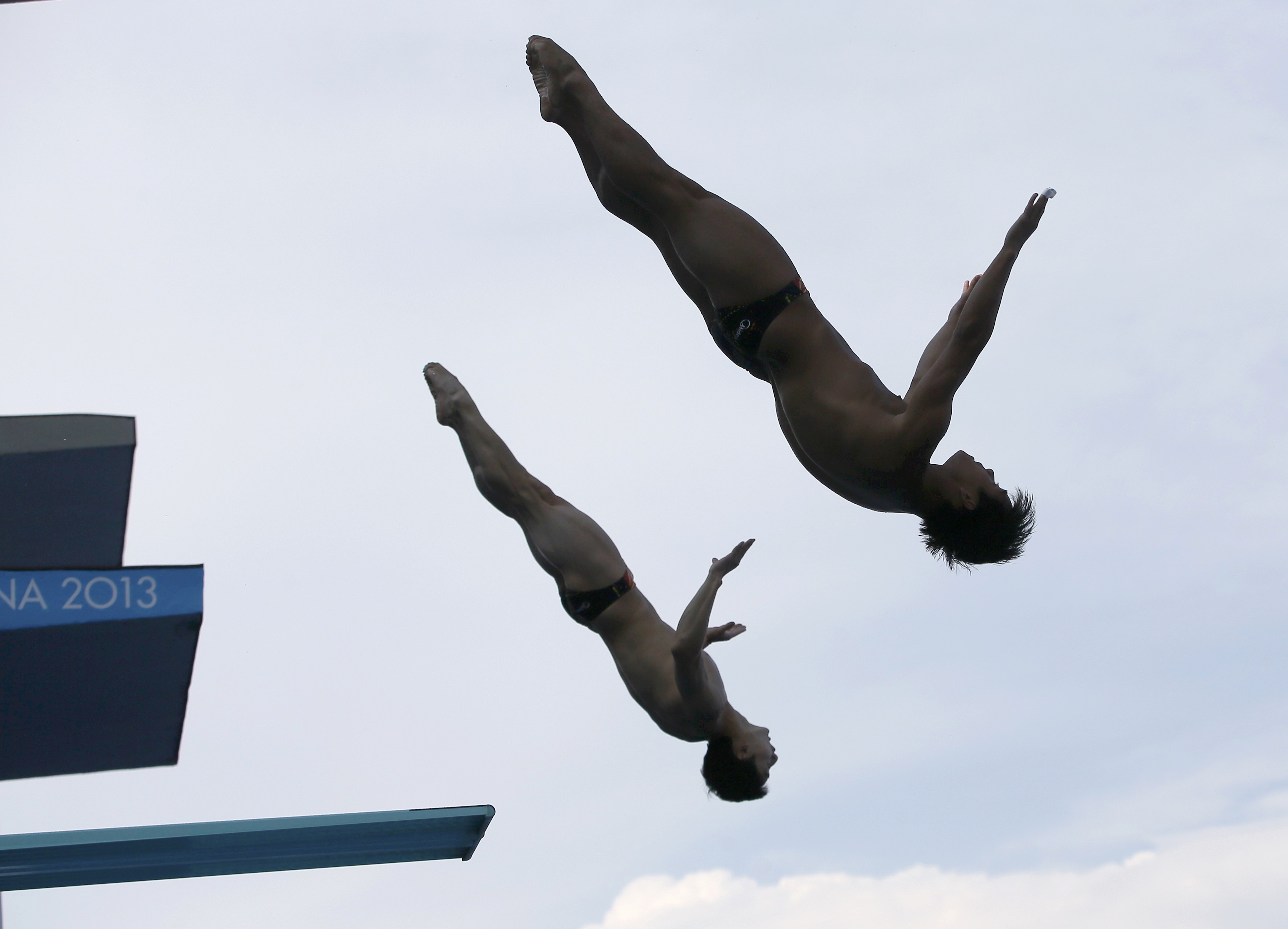 China's Qin and He at the men's synchronised 3m springboard final during the World Swimming Championships in Barcelona. Photo: Reuters