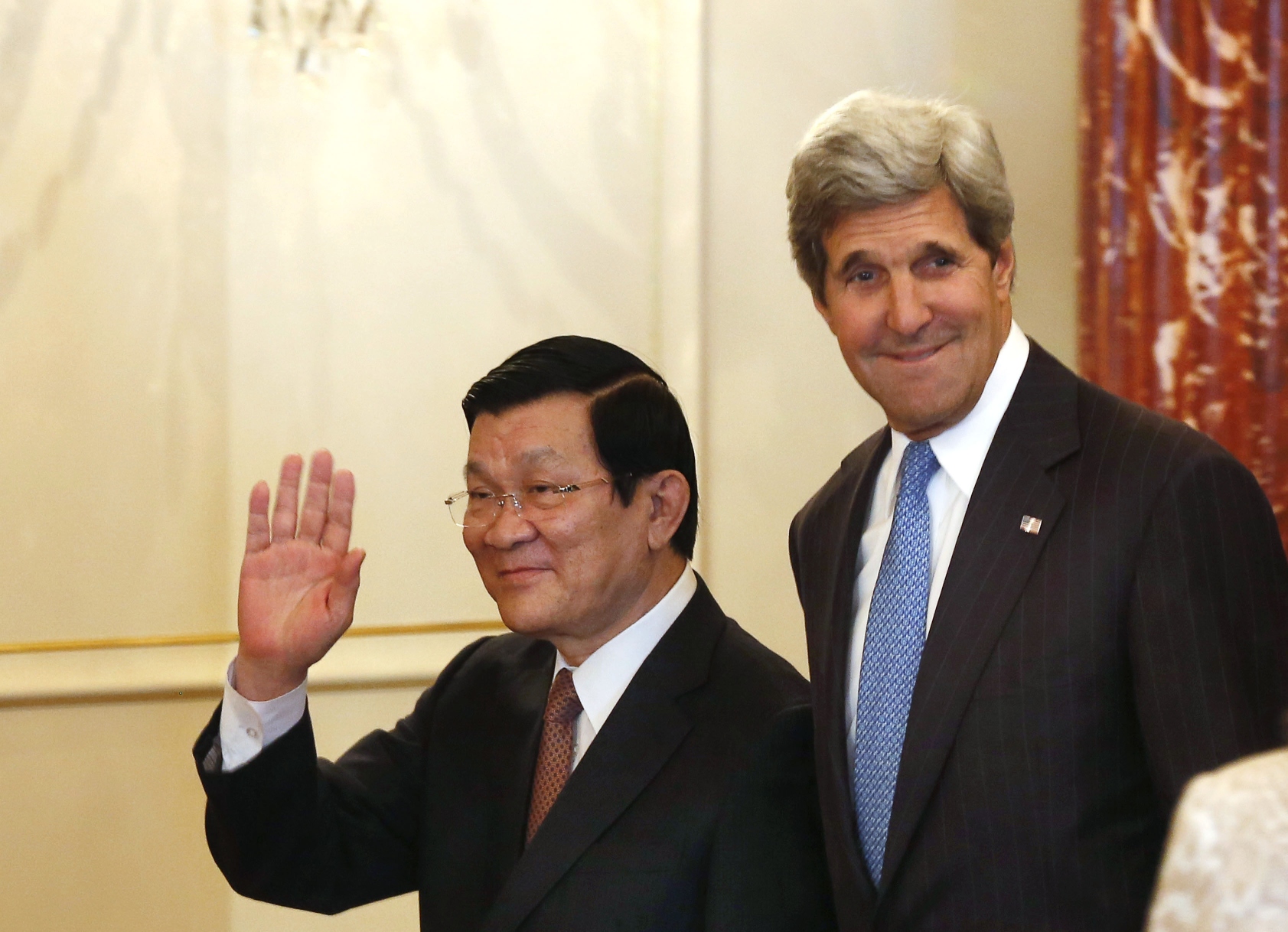 US Secretary of State John Kerry (right) walks to lunch with Vietnam's President Truong Tan Sang at the US State Department in Washington. Photo: Reuters