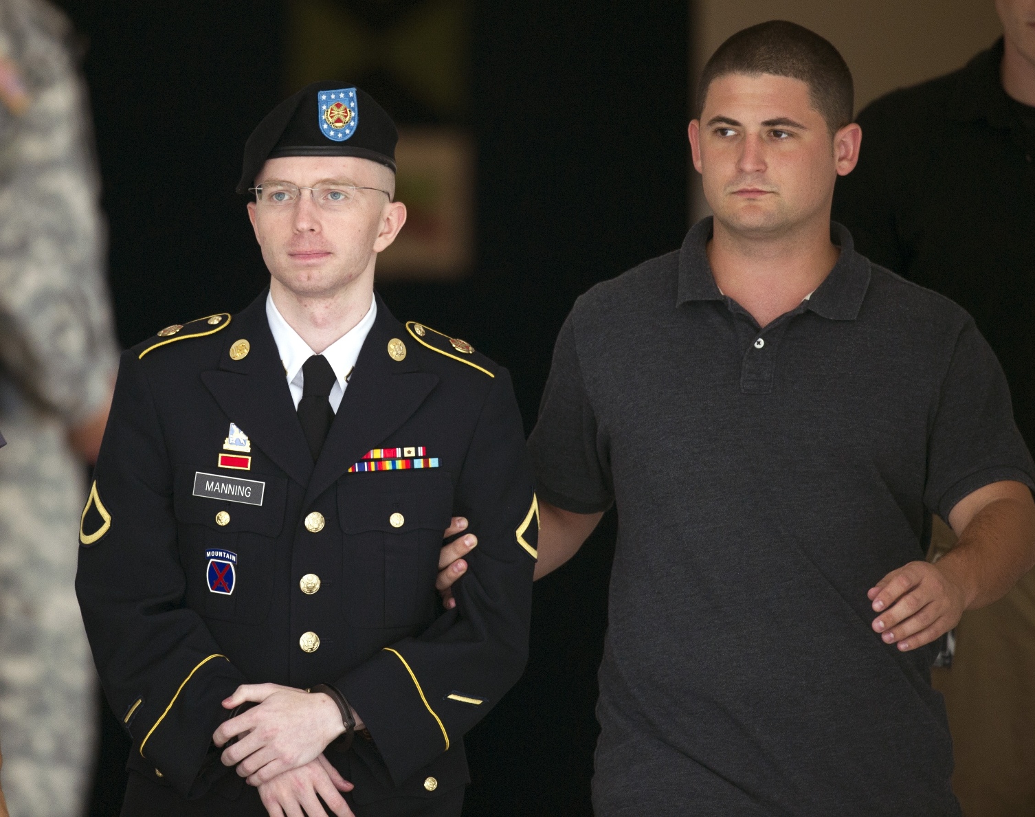 US soldier Bradley Manning is escorted out of a courthouse at Fort Mead on Thursday. Photo: AP
