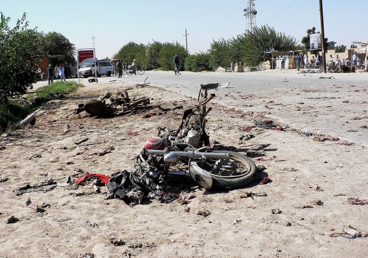 The wreckage of motorcycle at the site of a bomb blast in Aqcha in the Afghan province of Jawzjan last week. The explosion killed four including a policeman and wounded 11 civilians. Photo: AFP