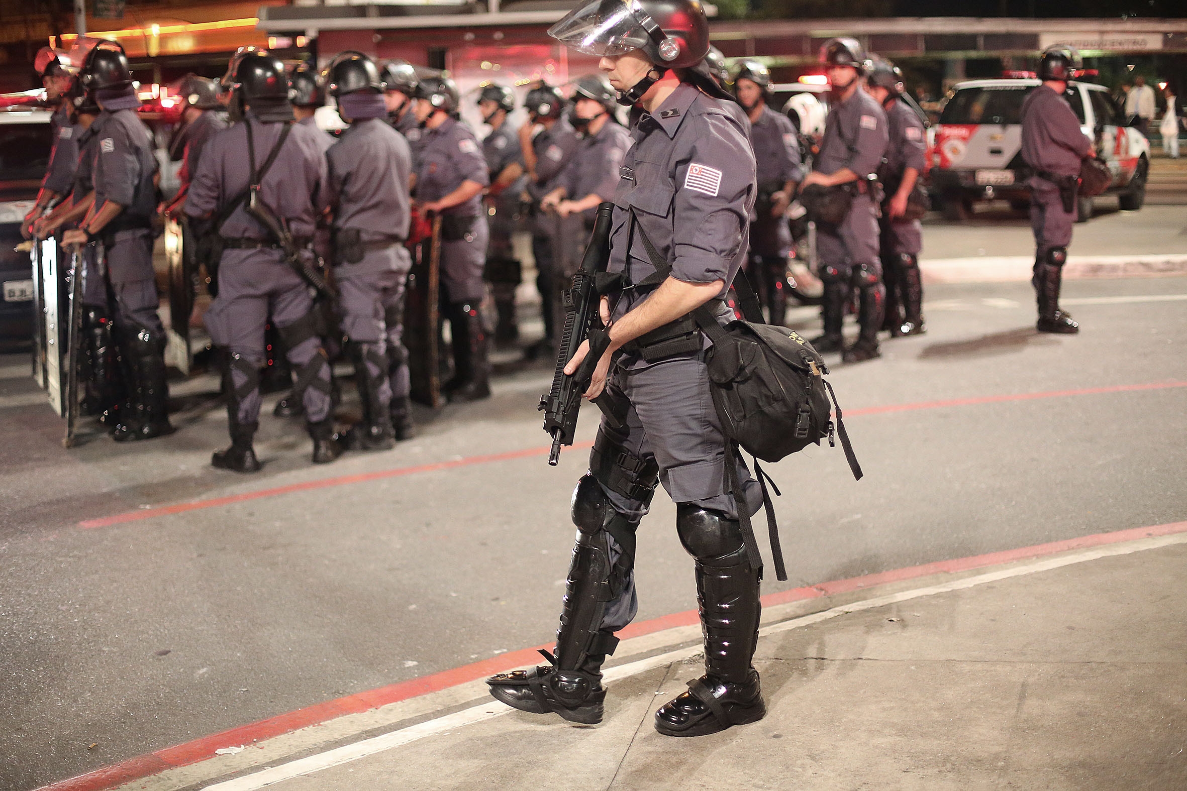 Police guard during a protest in support of Rio de Janeiro's protests and against Sao Paulo's governor Geraldo Alckmin in Sao Paulo, Brazil. Photo: Xinhua