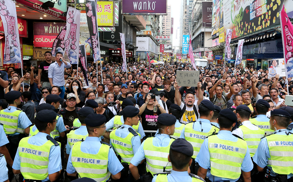 The August 4 rally in Mong Kok saw a stand-off between Alpais Lam's supporters and critics. Photo: Felix Wong