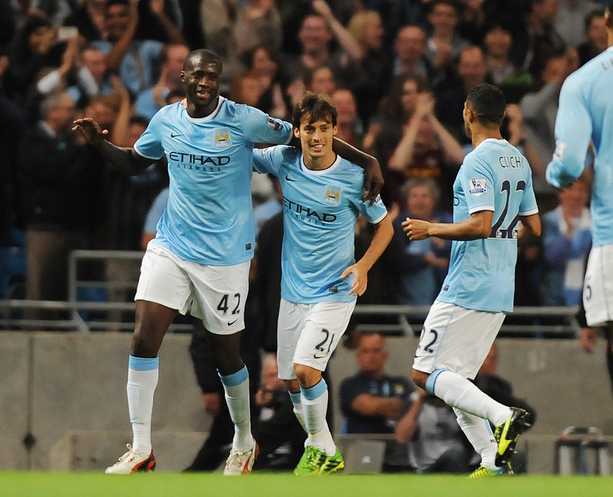 Manchester City's Yaya Toure (left) and teammate David Silva (centre) during the English Premier League match between Manchester City and Newcastle United. Photo: EPA