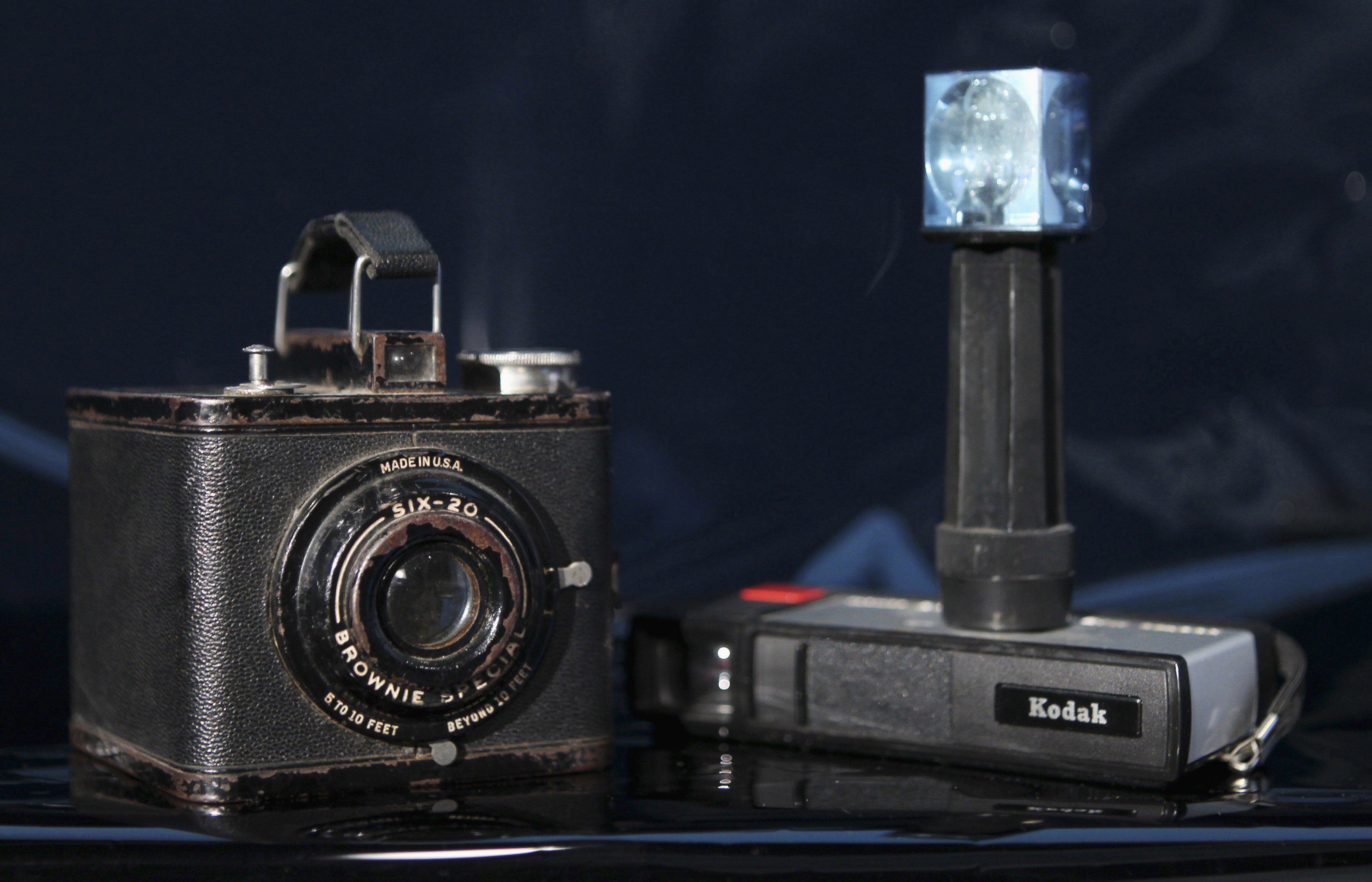Kodak once dominated the camera market with products like its Brownie Special Six-20 (left), and the Pocket Instamatic 20 (right), but the advent of digital cameras helped push it into bankruptcy. Photo: Reuters