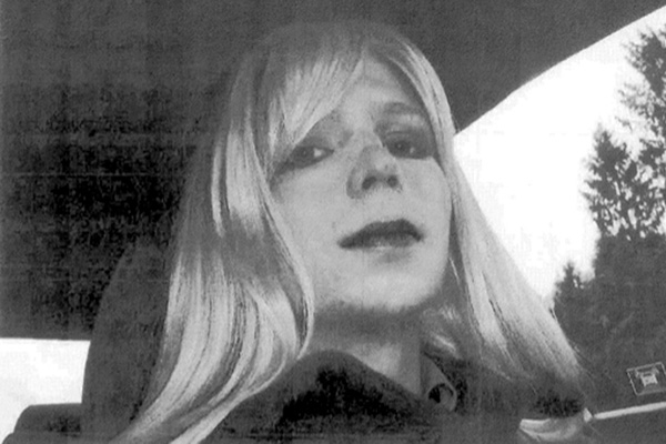 Bradley Manning poses wearing a wig and make-up. Photo: AFP