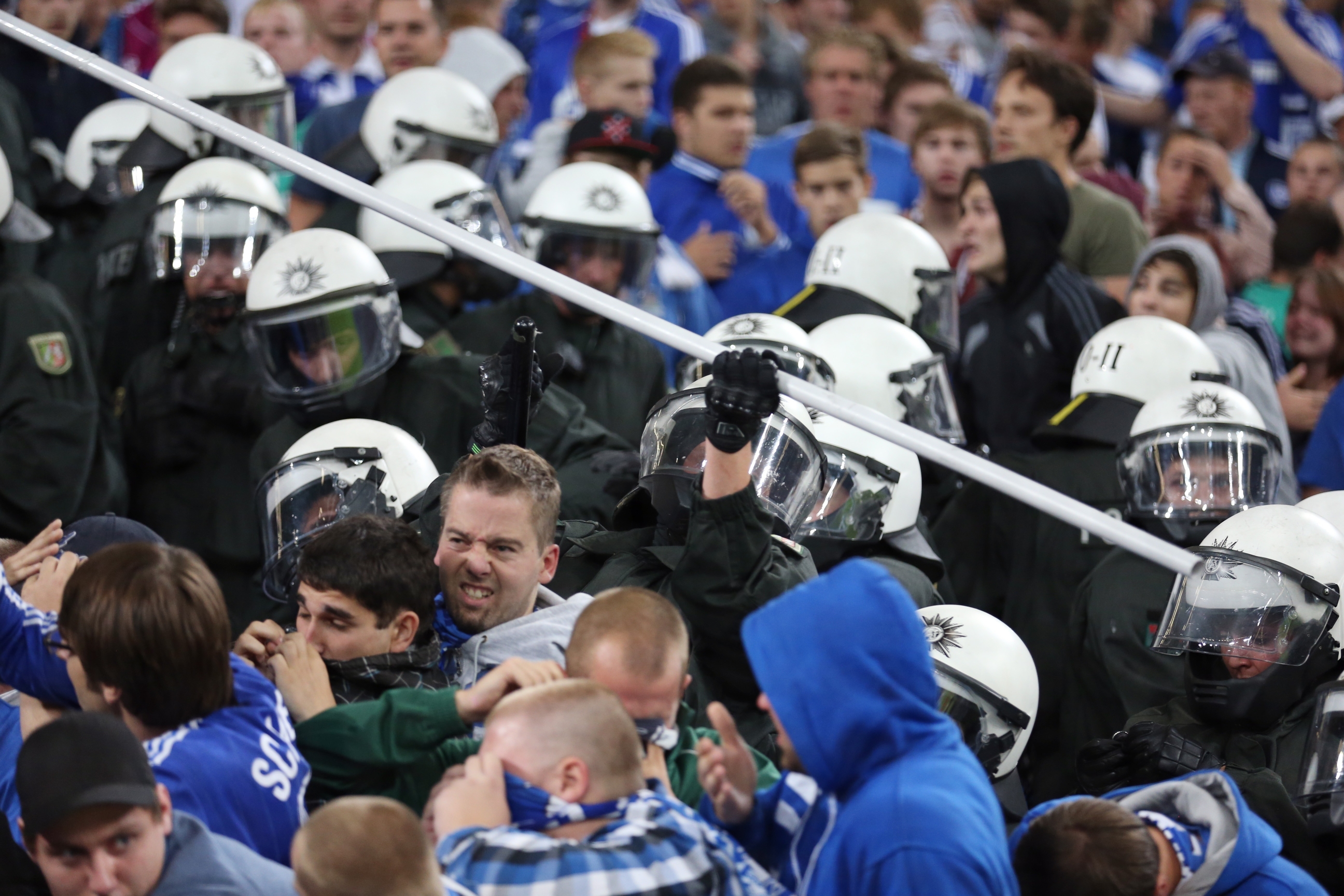German police confront supporters of Schalke during a Uefa Champions League soccer match on Wednesday between FC Schalke 04 and PAOK Saloniki in Gelsenkirchen. Photo: AFP