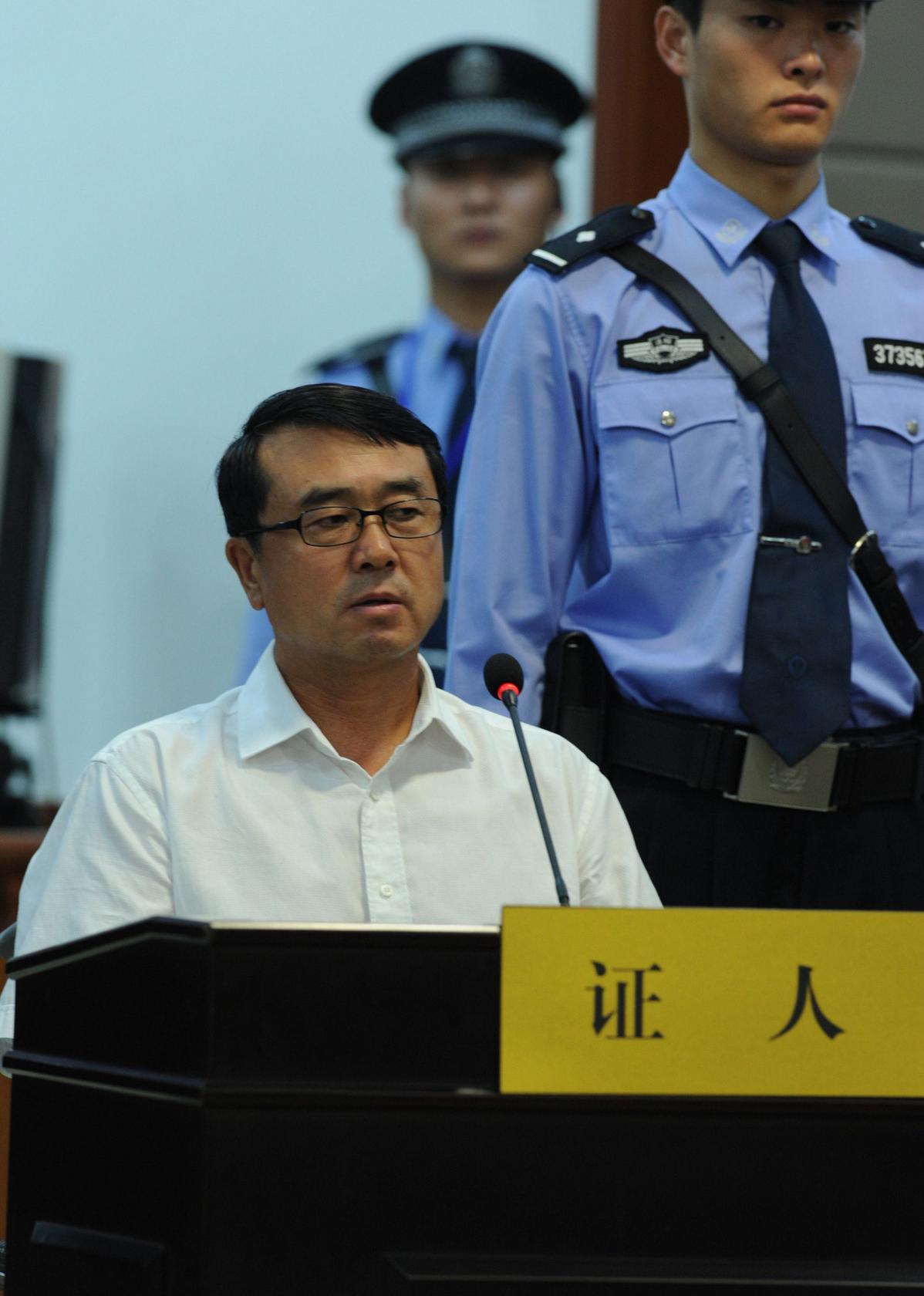 Wang Lijun, Bo's ex-police chief, testifies in the Jinan court. He argued with Bo and "defected" to the US consulate in Chengdu. Photo: AFP