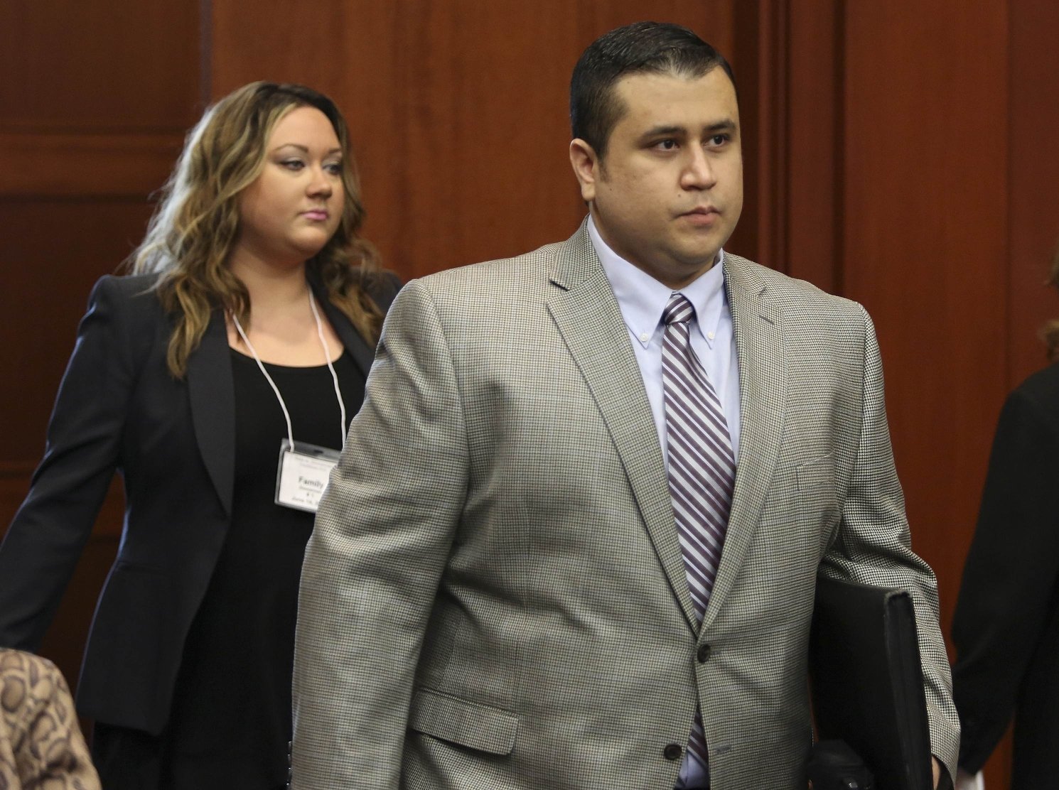 George Zimmerman, followed by his wife Shellie (left). Photo: Reuters