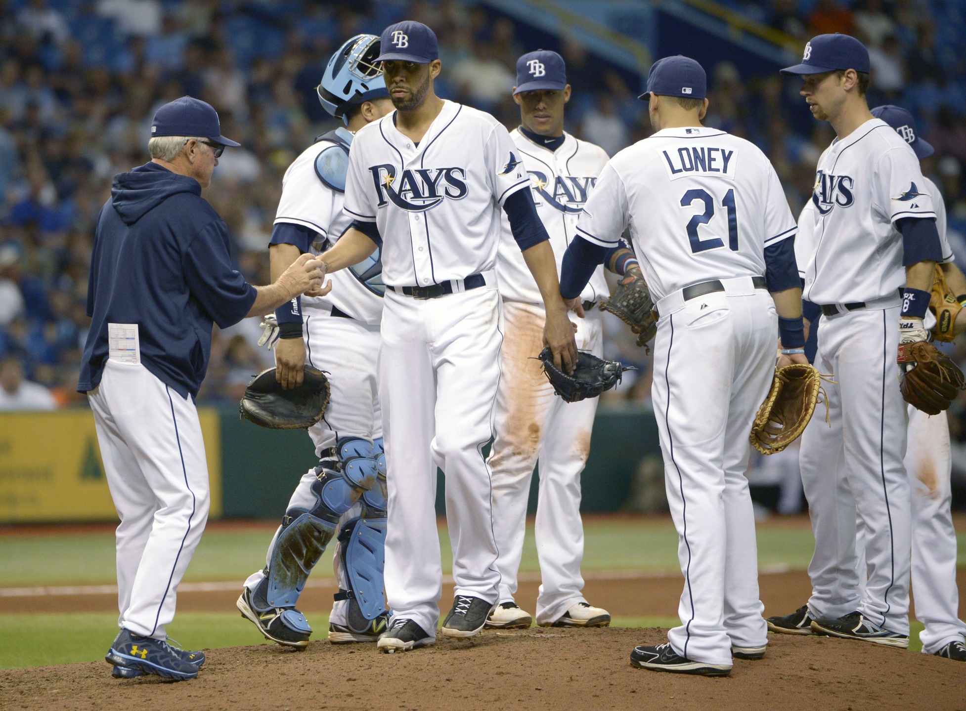 Manager Joe Maddon praises Tampa Bay Rays players for achieving 90 regular-season wins for the fourth year in a row. Photo: AP