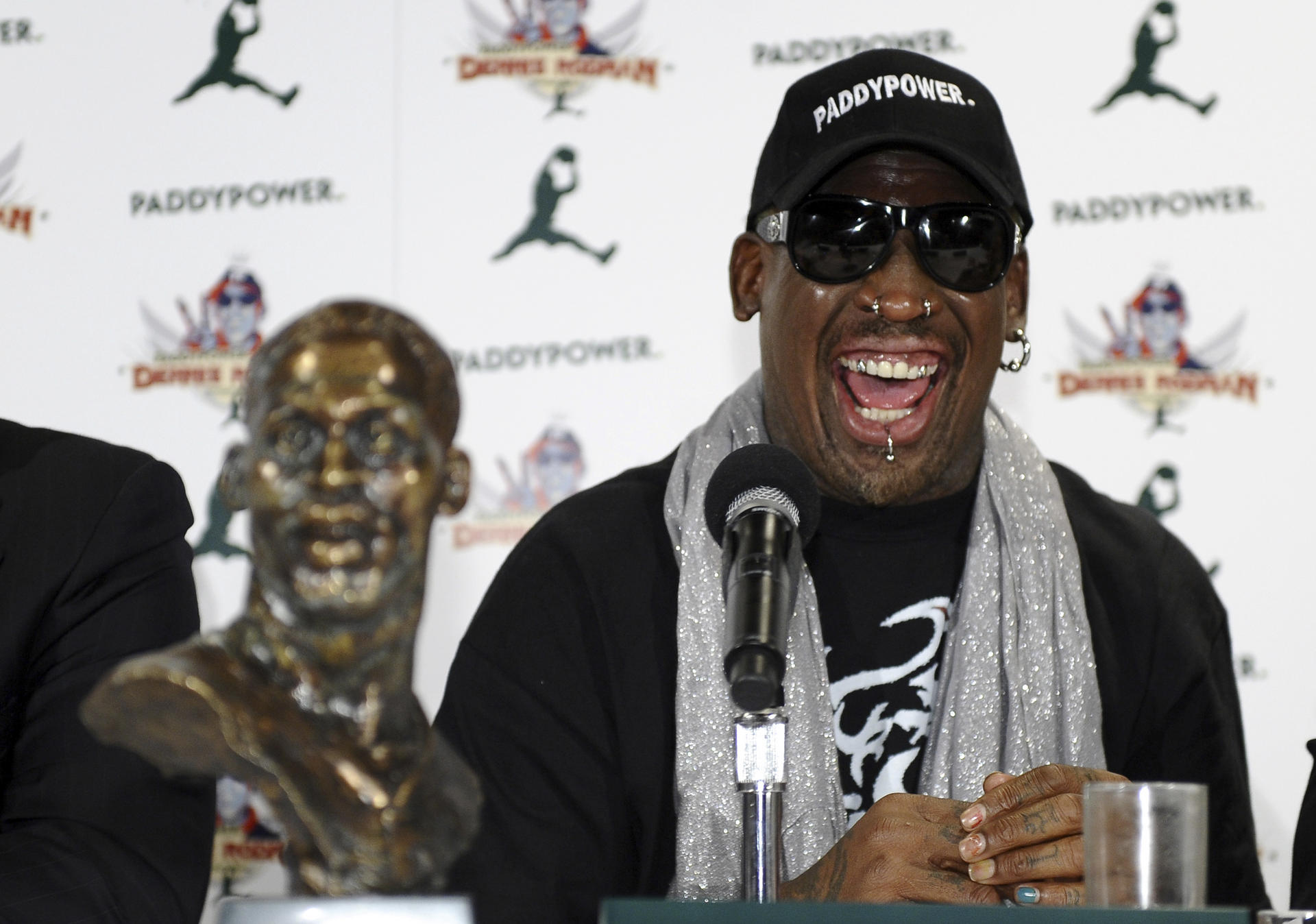 Former-NBA player Dennis Rodman holds a press conference in New York on September 9, to discuss his recent trip to North Korea. Photos: AFP; AP