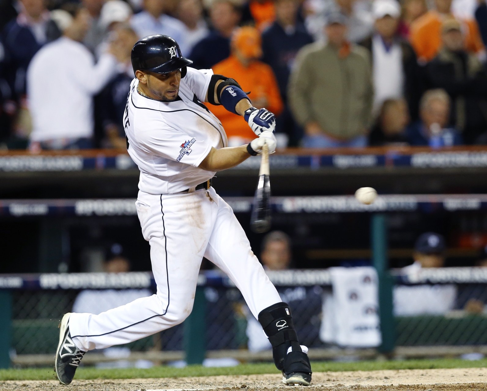 Detroit Tigers' Omar Infante hits a two-run double against the Oakland Athletics. Photo: AP