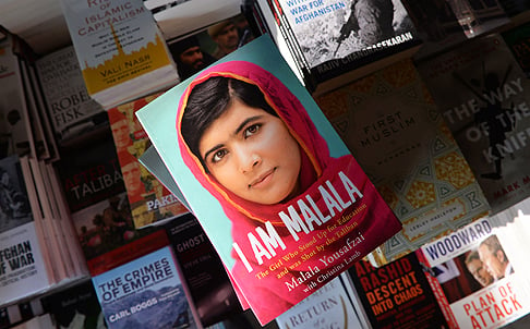 A copy of the memoirs of Pakistani child activist Malala Yousafzai is pictured in a bookstore in Islamabad on Tuesday. Photo: AFP