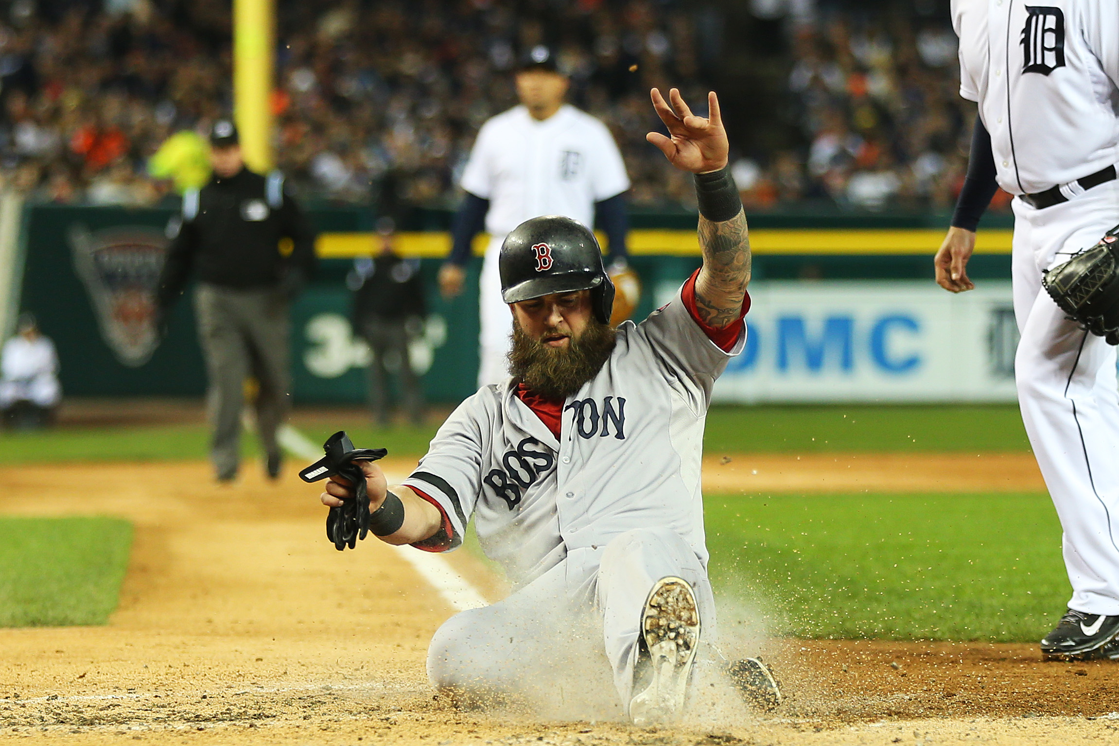 Mike Napoli of the Boston Red Sox scores on a wild pitch by Anibal Sanchez of the Detroit Tigers in the third inning of game five. Photo: AFP