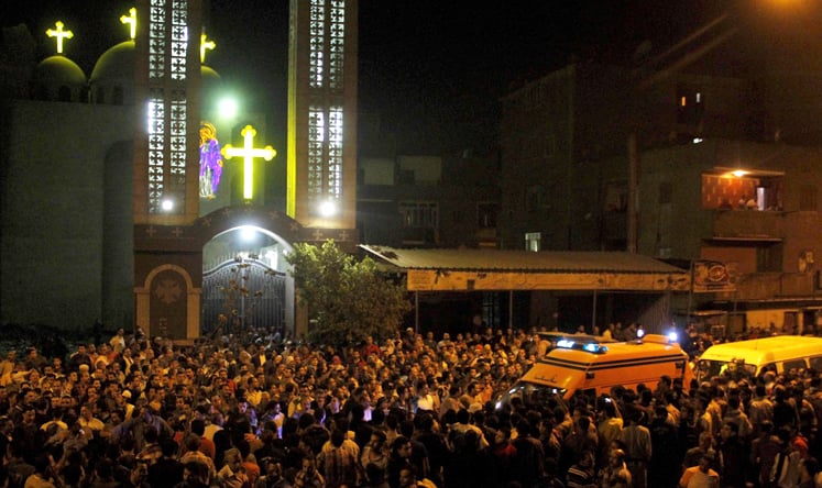 Gunmen fired at people leaving after a wedding at a Coptic Christian church. Photo: EPA