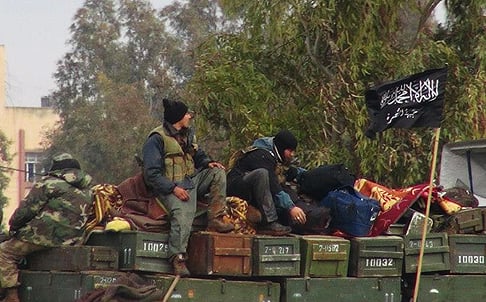 Rebels from al-Qaida affiliated Al-Nusra Front sit on a truck full of ammunition in Idlib province, northern Syria in this file photograph. Photo: AP