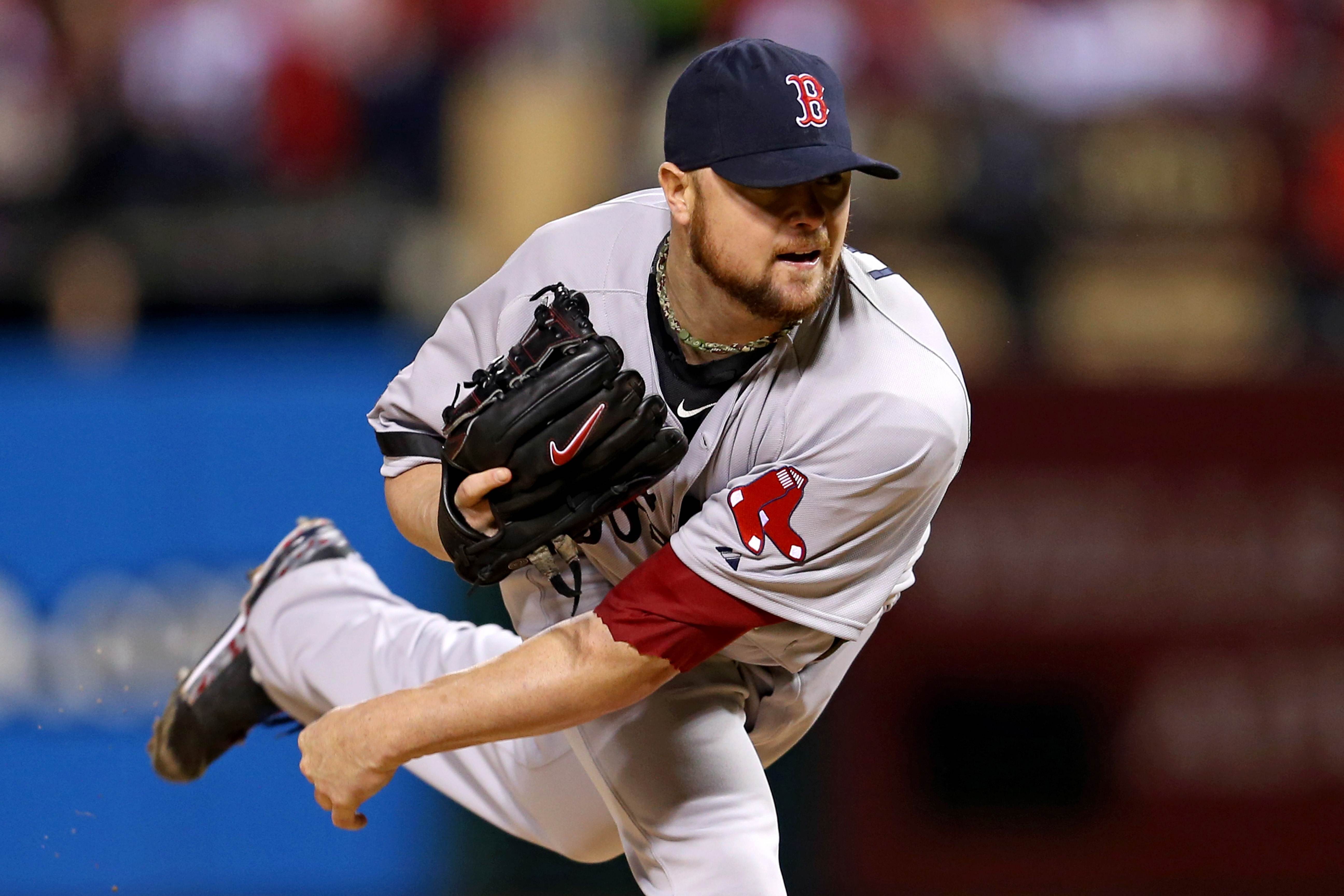 Jon Lester enjoys another fine outing, this time helping the Boston Red Sox to a 3-1 victory against the Cardinals in game five of the World Series. Photo: AFP
