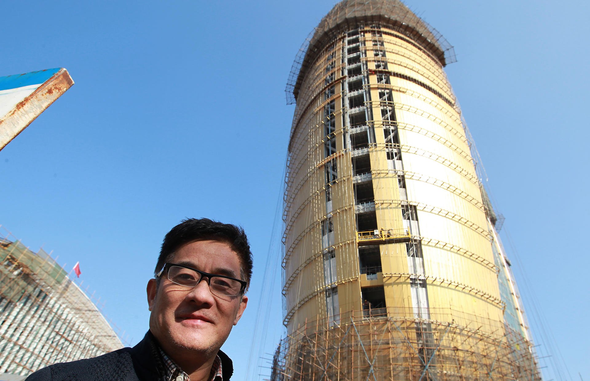 Zhou Qi, chief architect of the People's Daily tower, is proud of his new building in the capital. Photo: Simon Song