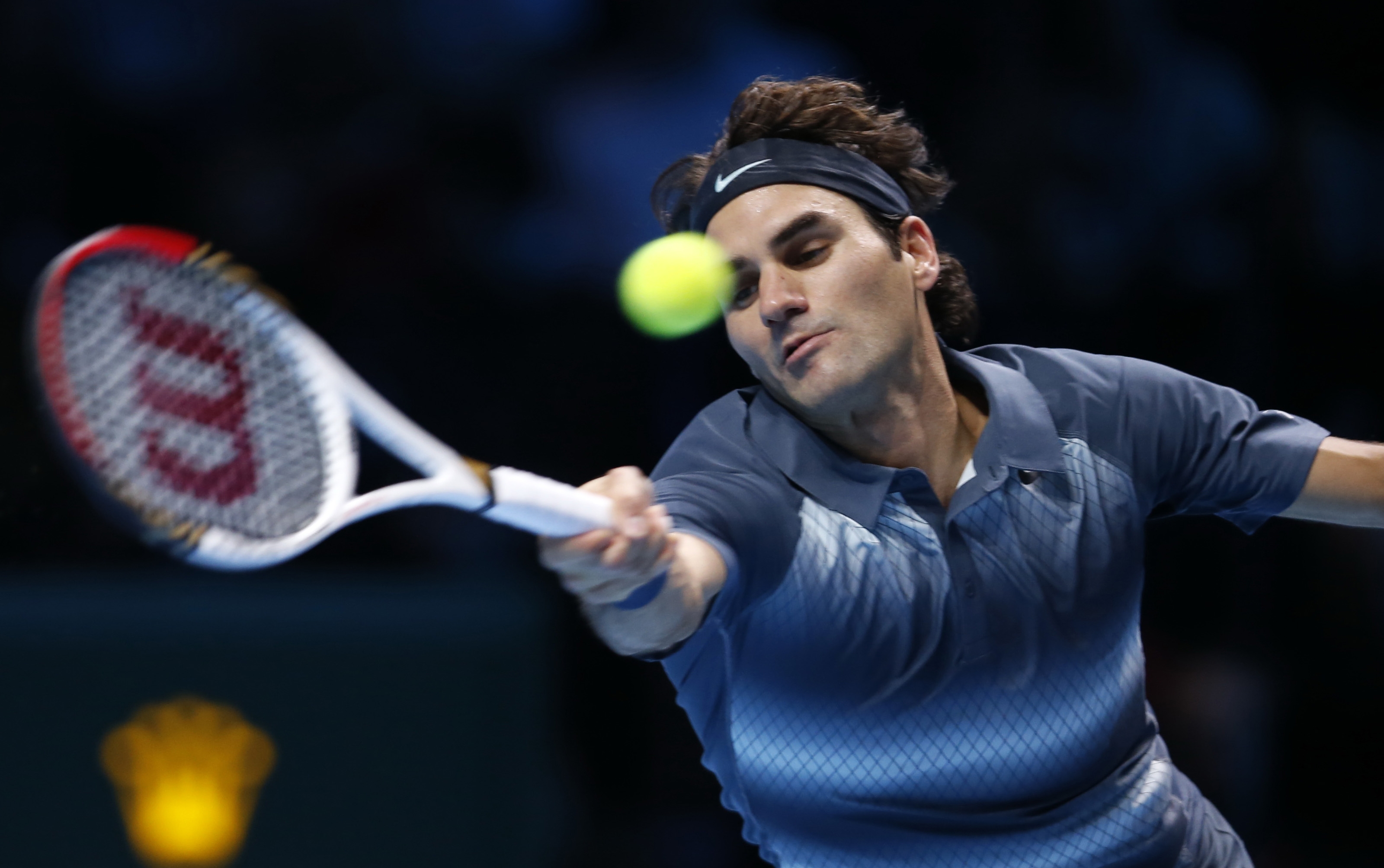 Roger Federer of Switzerland in action against Juan Martin del Potro of Argentina 