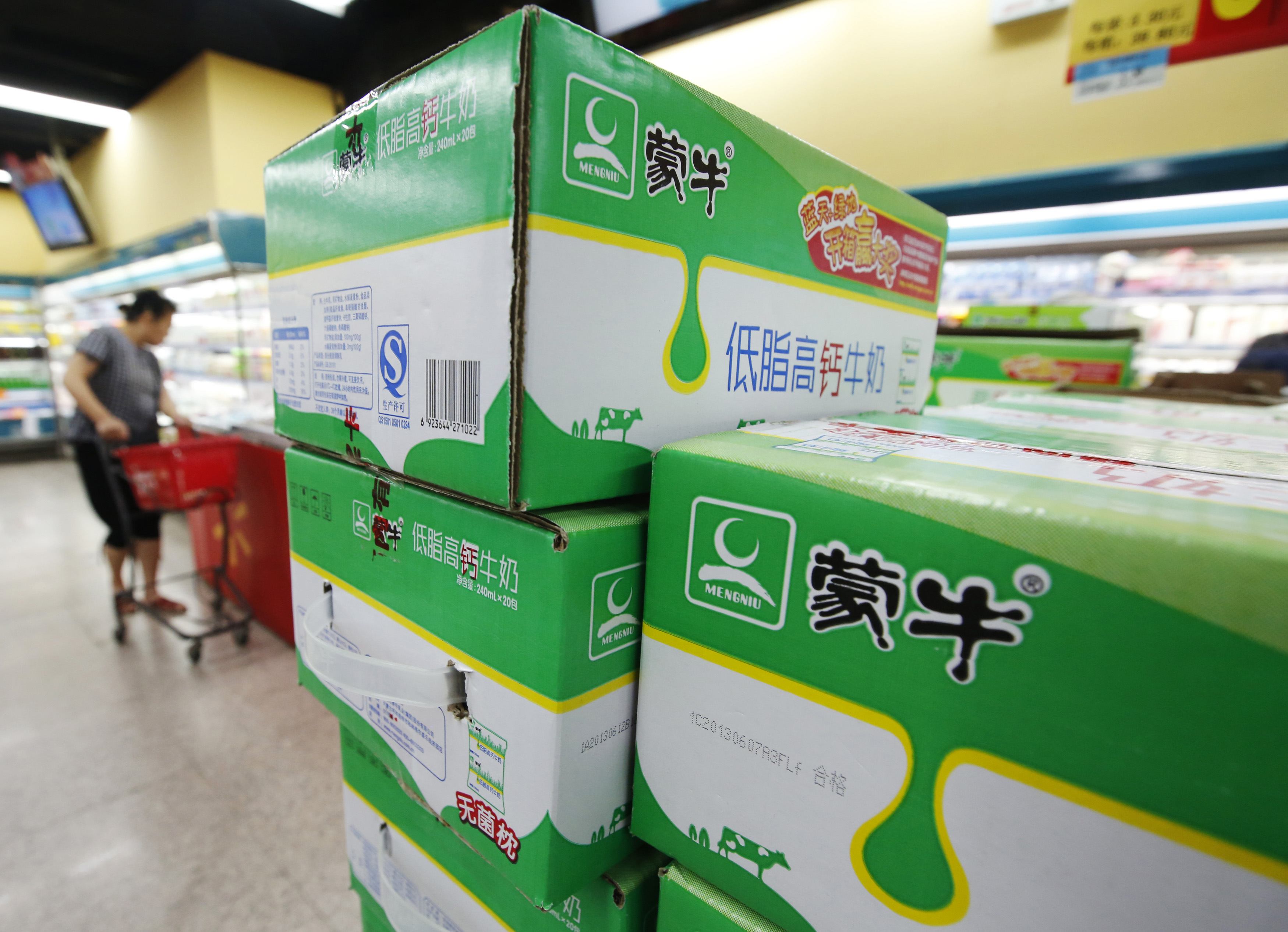 Mengniu failed to acquire enough shares of its smaller rival to trigger a compulsory takeover, so must sell down part of its stake to maintain a required public float. Photo: Reuters