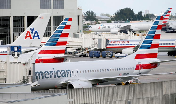 The merger will allow American Airlines to emerge from bankruptcy. Photo: AFP