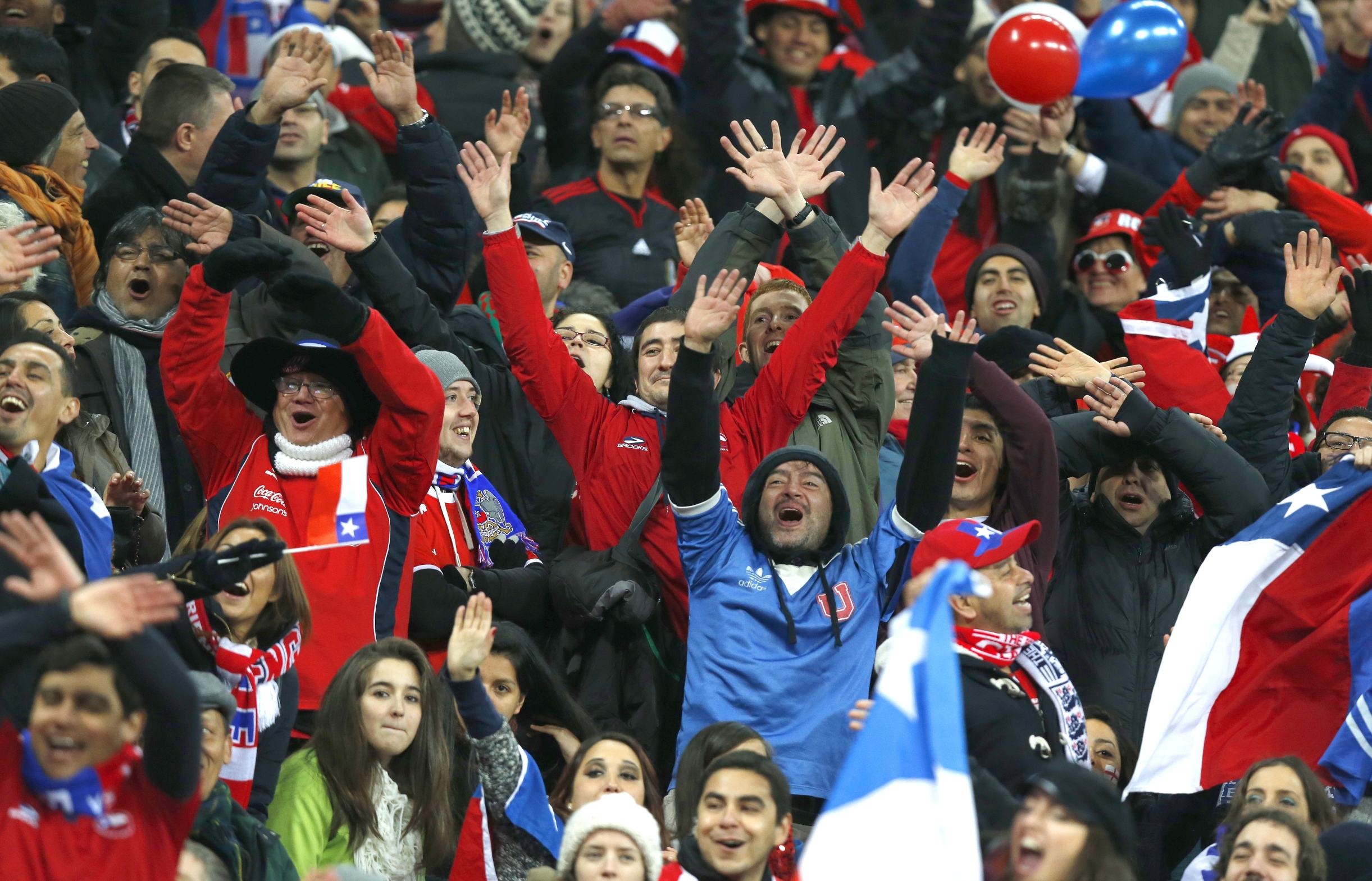 Chile's fans celebrate during the international friendly match between England and Chile at Wembley Stadium in London. Photo: AP