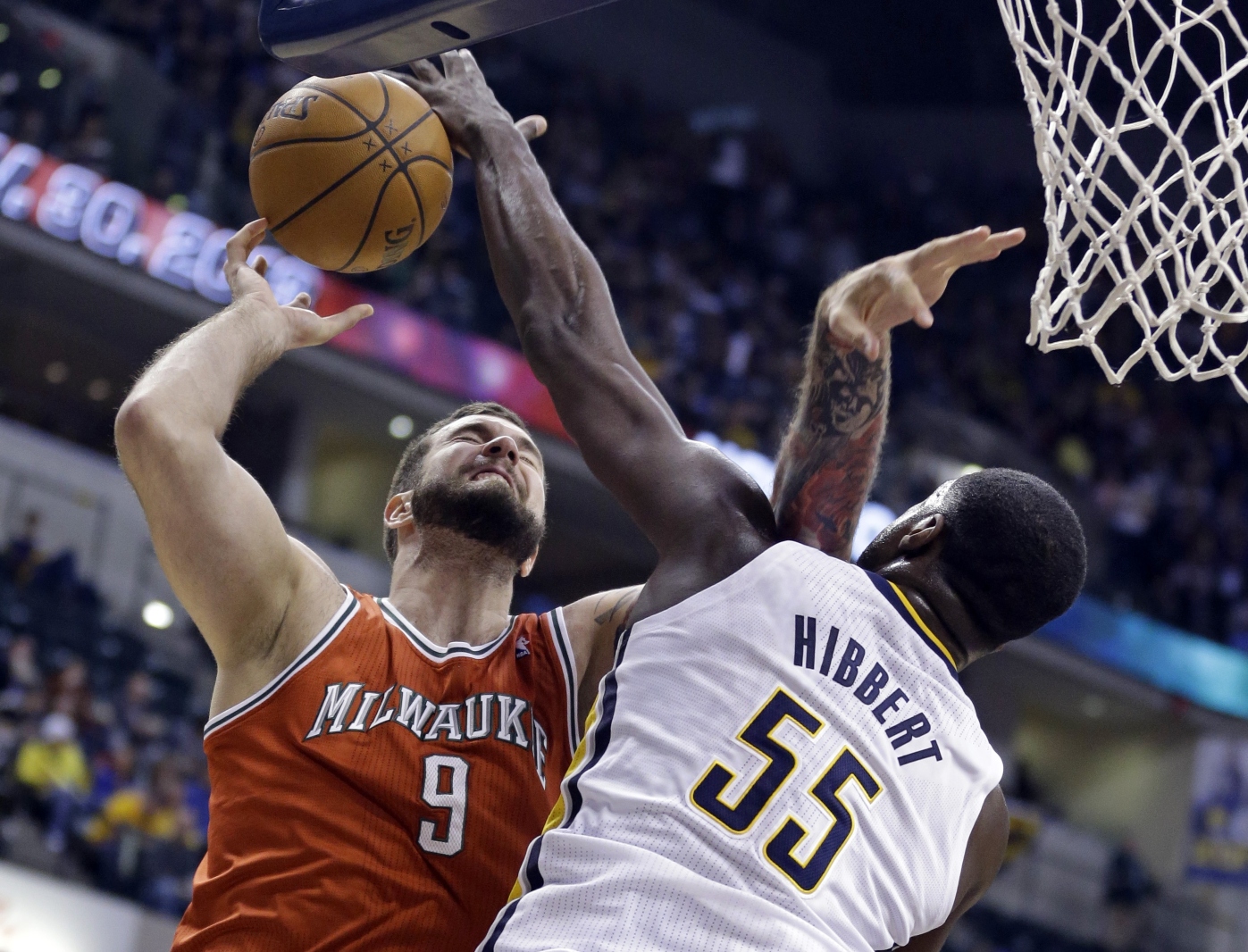 Indiana Pacers center Roy Hibbert blocks the shot of Milwaukee Bucks centre Miroslav Raduljica during the first half of an NBA game in Indianapolis. Photo: AP