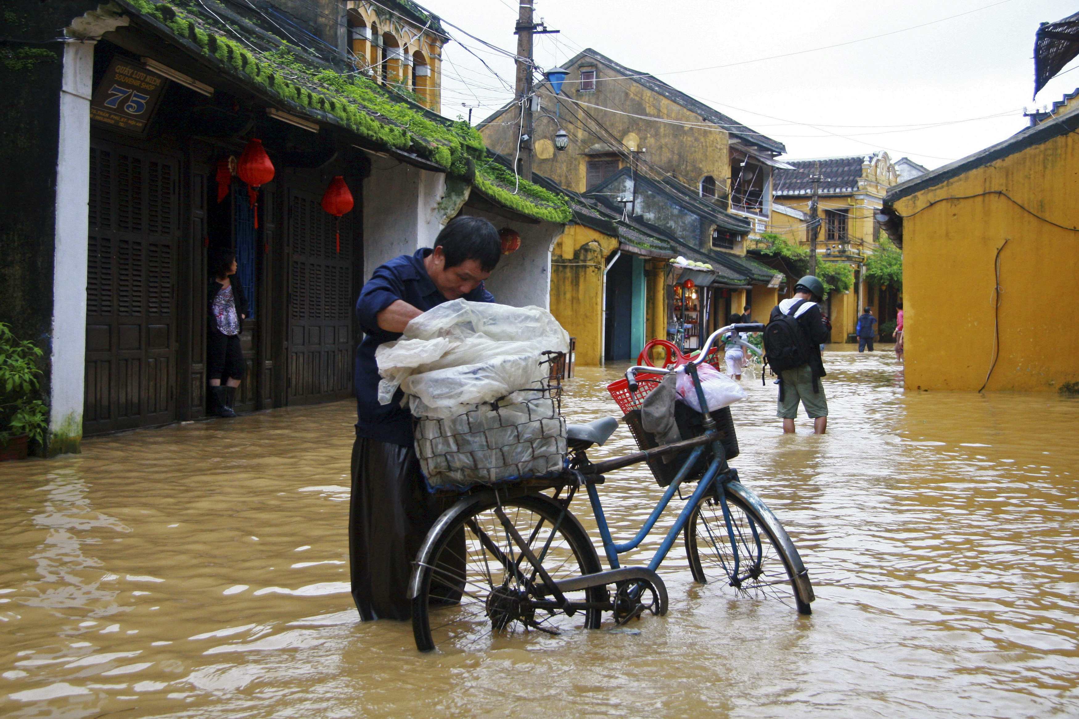 Flooded street in Vietnam's central town of Hoi An. Photo: Reuters