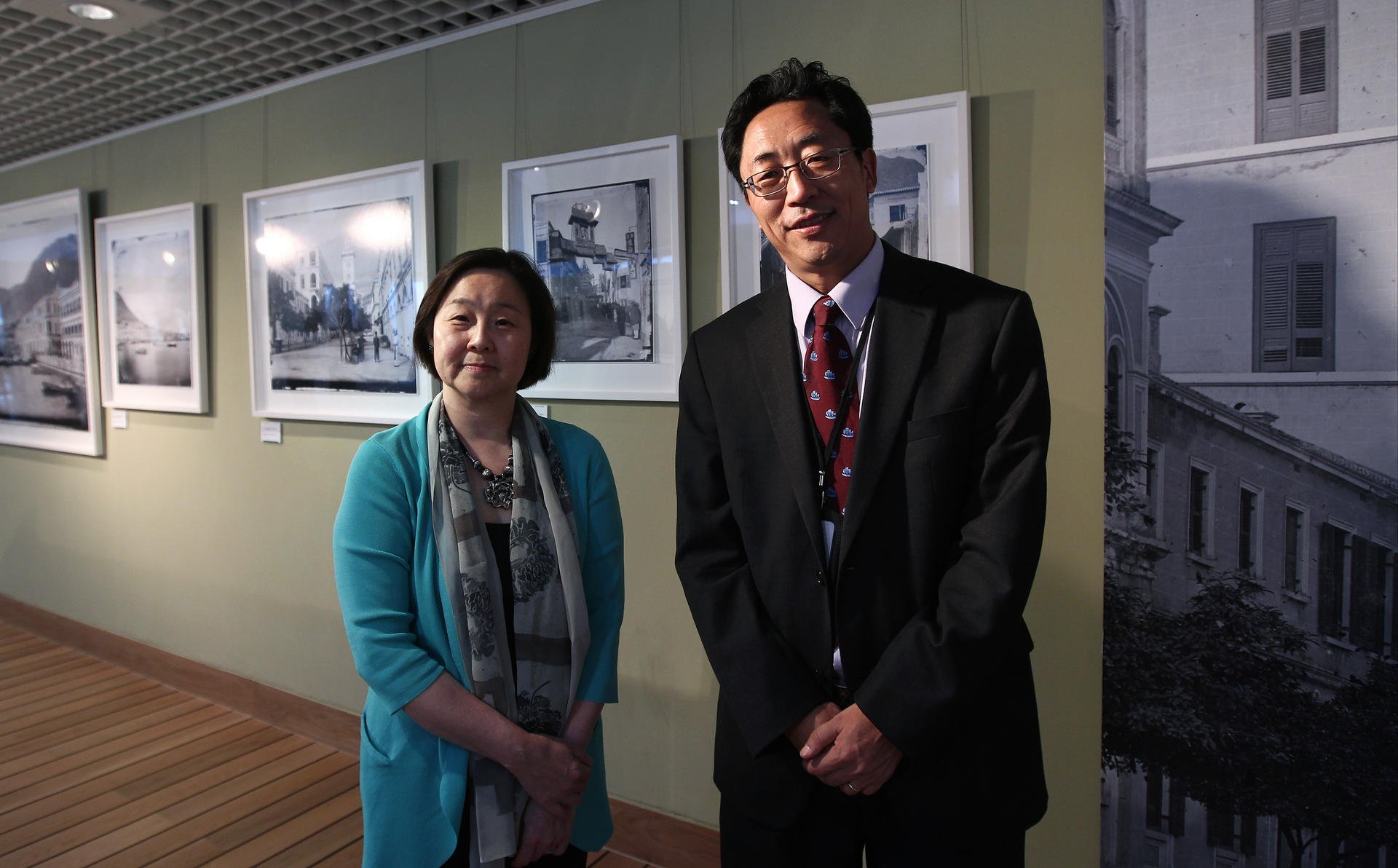 Curator Betty Yao and the Maritime Museum's Jiao Tianlong with the exhibition. Photo: Jonathan Wong